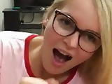 Sexy blond with glasses sucks cock and eats cum